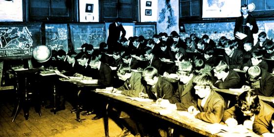 Students in old timey classroom